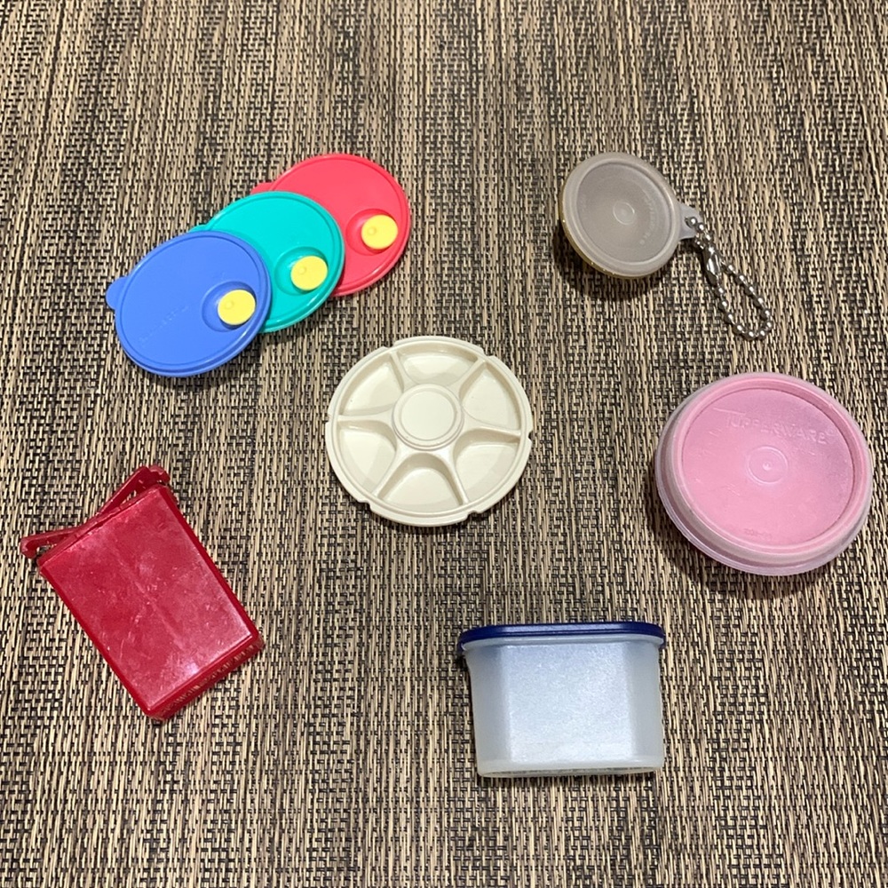 6 mini Tupperware items. 3 magnets, I keychain, 1 mini S&P shaker & 1 smidget